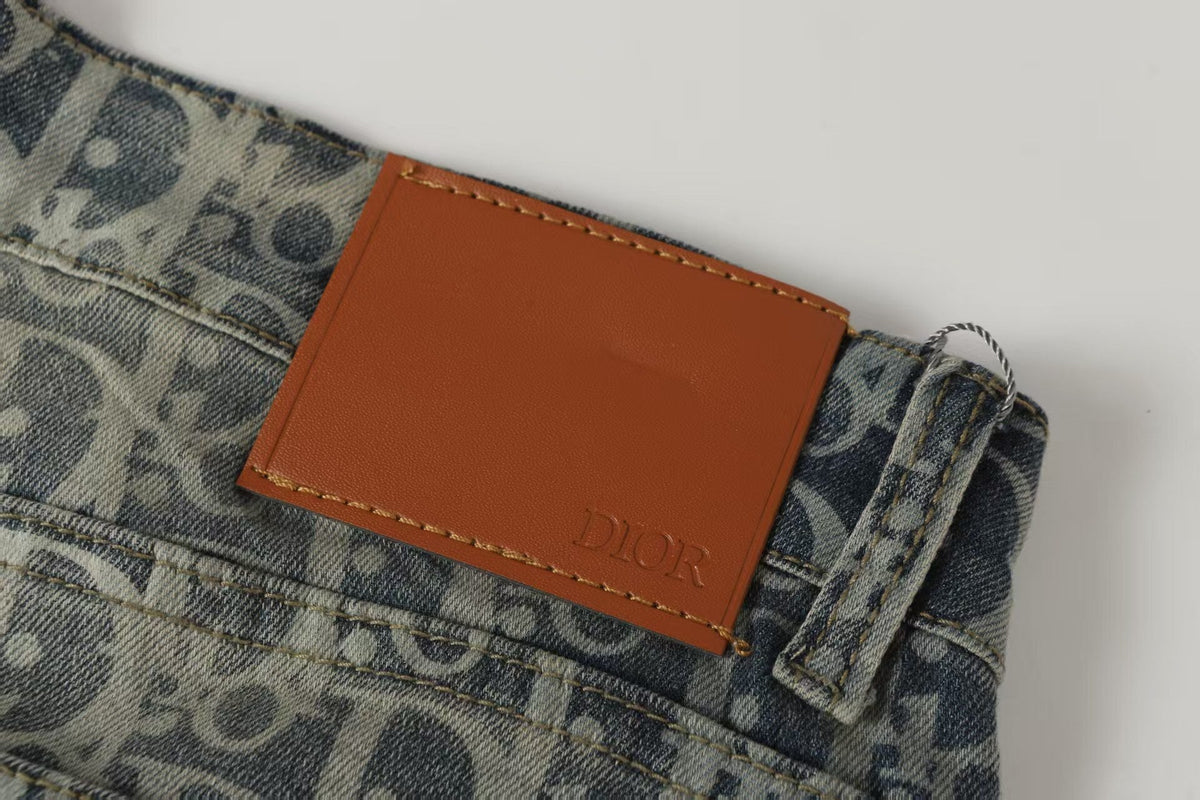 Oblique All-Over Print Faded Denim Jeans | Blue
